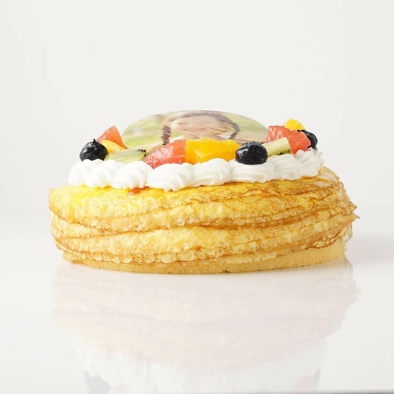 【冷凍】みずみずしいフルーツが乗った写真ケーキ ミルクレープ 17.5cm｜ケーキ｜いちごおじさんの洋菓子工房│ミルクレープ ホール - スイーツモール